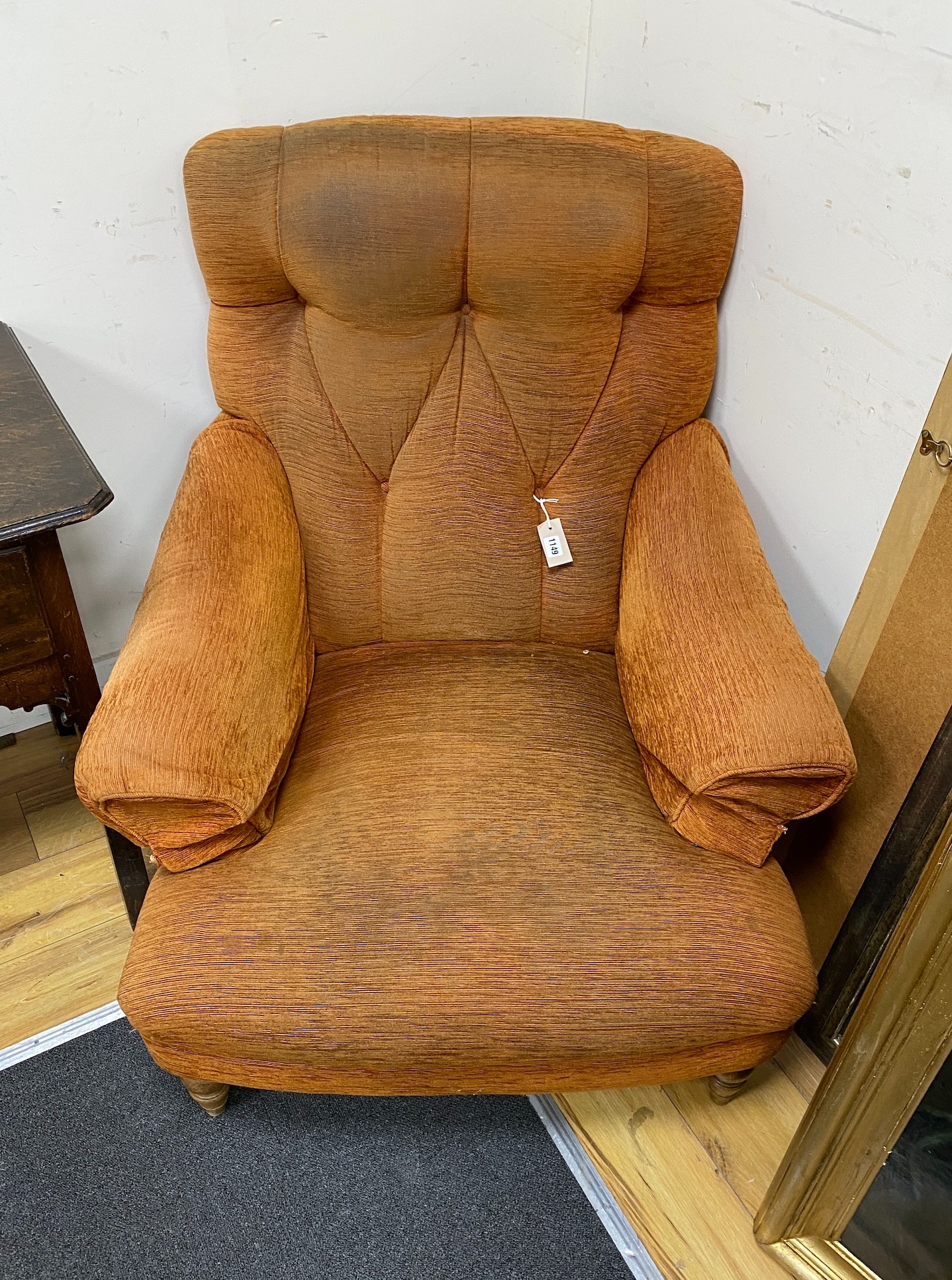 A Howard style upholstered armchair, width 88cm, depth 88cm, height 82cm
